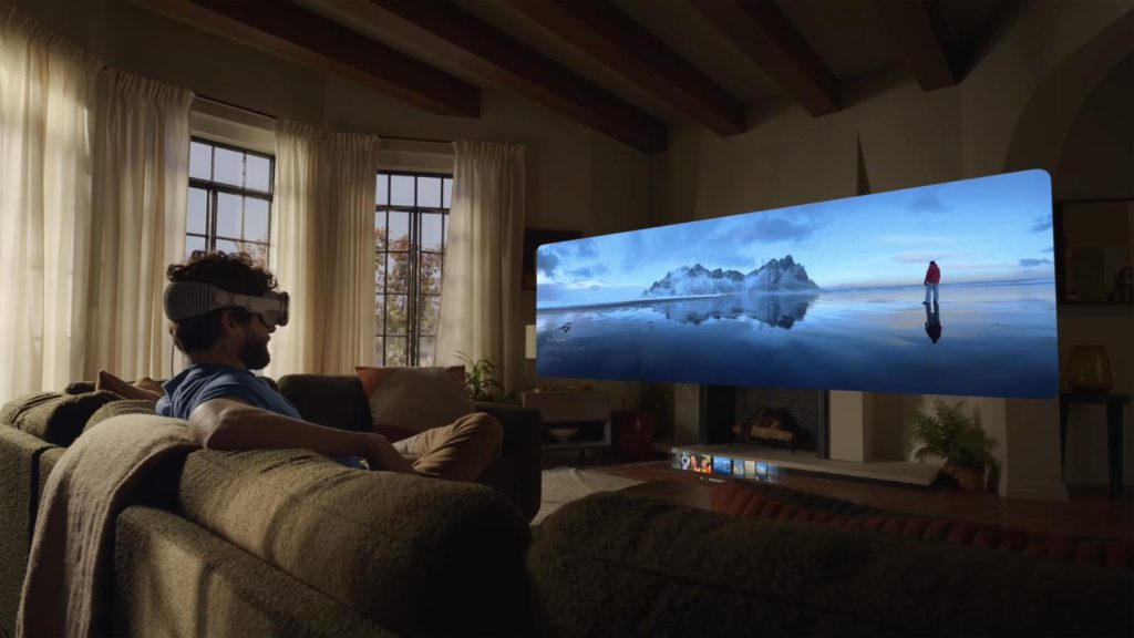 A person wearing apple vision pro headset watching a movie