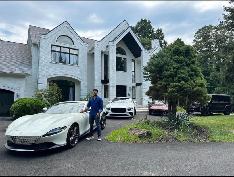 Shahid Anwar - Standing in front of his home and collection of luxury cars (1)